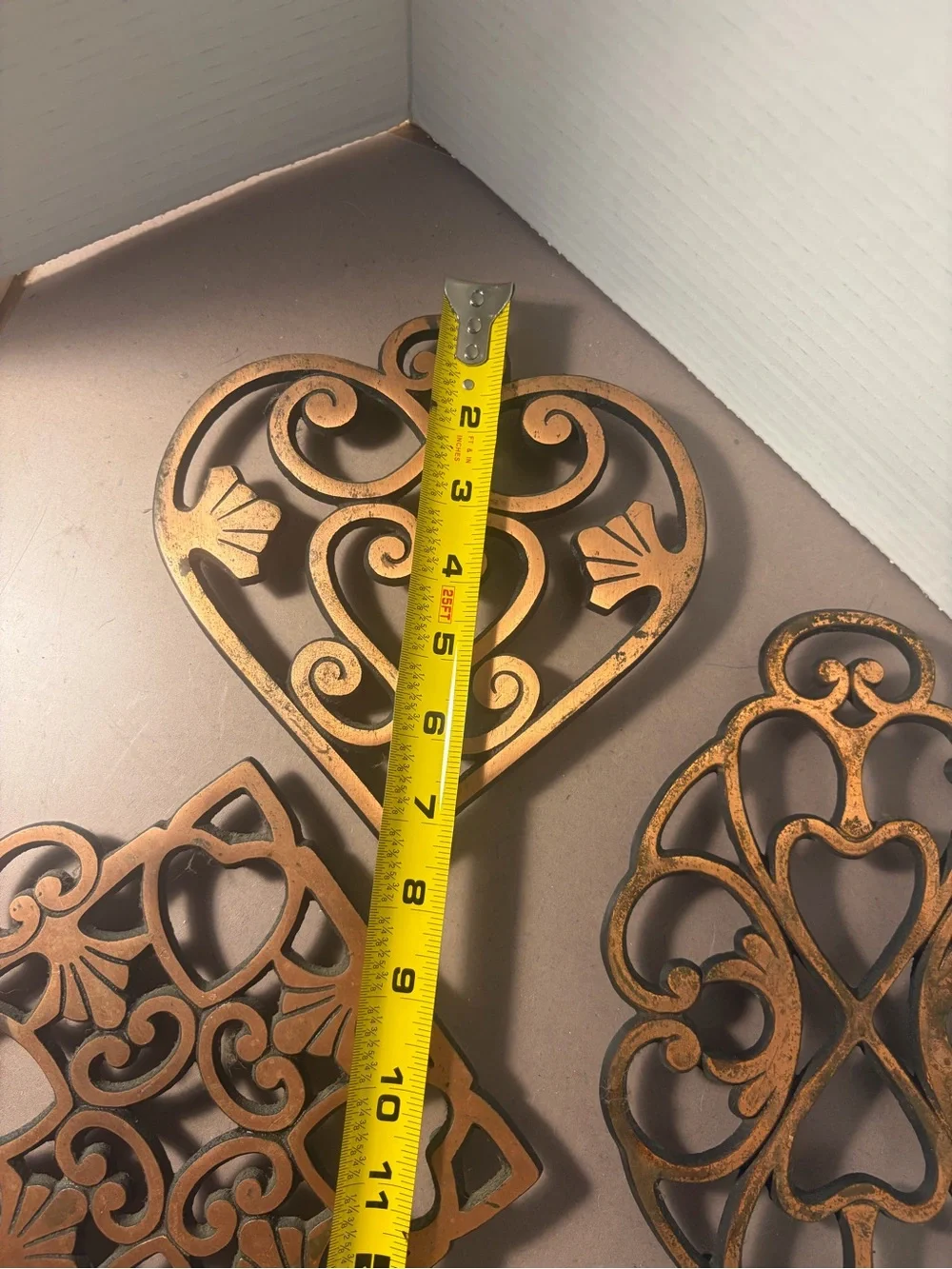 Pampered Chef Copper-Tone Decorative Cast Iron Trivets Set